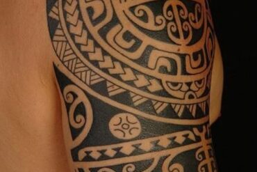 "Explore the fusion of ancient artistry and modern body art with tribal shoulder tattoos. Embrace cultural heritage and personal expression through intricate designs that adorn your shoulders with timeless elegance." tribal shoulder tattoo